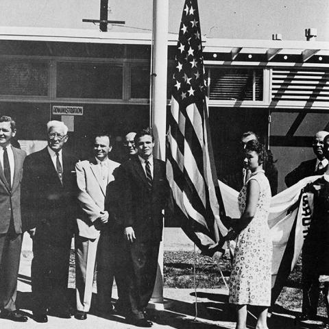 President of Associated Students, Ben Rude (center) with faculty and administrators at the satellite campus opening in 1956.