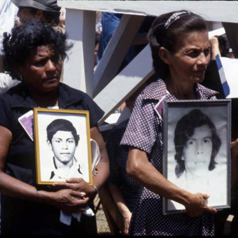 Two grieving women await Pope John Paul II, Managua, Nicaragua, 1983