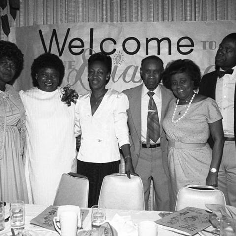 Honorees and guests of the Watts Branch NAACP Freedom Fund Banquet pose with Assemblywoman Maxine Waters at the Chester Washington Golf Club House in Los Angeles. Pictured are (from left), honoree, Sadie Robinson; honoree, Marcine B. Shaw; guest speaker, Maxine Waters; honoree, James H. Hawkins Sr.; Watts Branch NAACP member Elizabeth (Pat) Eastman, and an unidentified man. 1984. Digital ID: 11.06.GC.N35.B22.01.06.82A