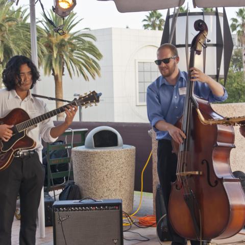 Musicians add to the atmosphere of the Grand Opening reception