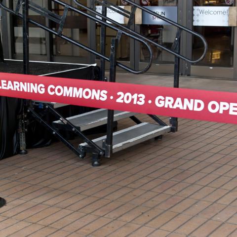 The Grand Opening ribbon before cutting