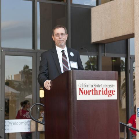 Library Dean Mark Stover speaks at the Grand Opening