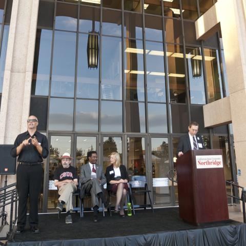 Dean Stover delivers an introductory speech at the Learning Commons Grand Opening.