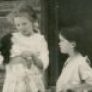 Eva and her lifelong friend, Damarie Peck Reyonds (holding doll) at the Western Hills, Robert and Eva Tharp Collection