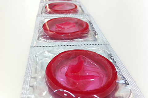 Red condoms in packaging