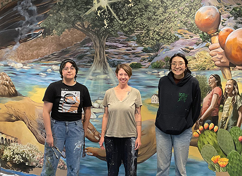 Lindsay Carron and Art students in front of the Tatavium Land Acknowledgment Mural