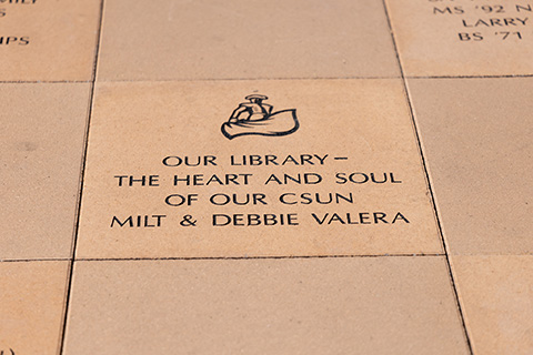 Library paver stone engraved with “Our Library — the Heart and Soul of our CSUN.