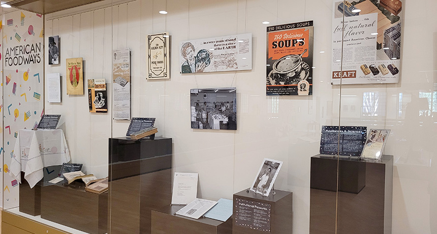 Display case in the Exhibit Gallery at CSUN University Library displaying cookbooks and other culinary collections.