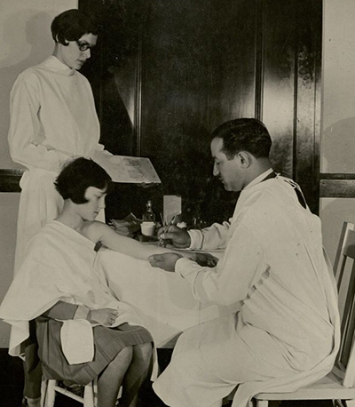 Child receiving an inoculation, California Historic Photographs Collection.