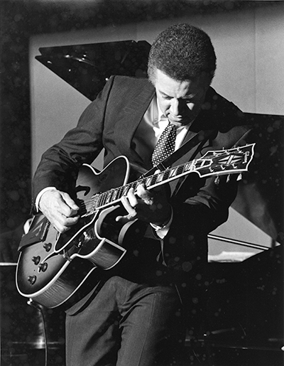 Kenny Burrell playing guitar at the Lazben Hotel, Los Angeles, 1990.