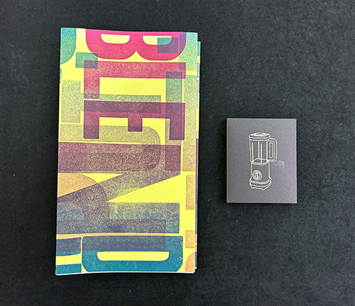 multi-colored book cover with title next to small rectangle pack of prints with a graphic of a blender in gold; Put It In a Blender by the Spring 2019 Printmaking III: Relief class with instructor Jamie Russom, N7433.4.P88 2019