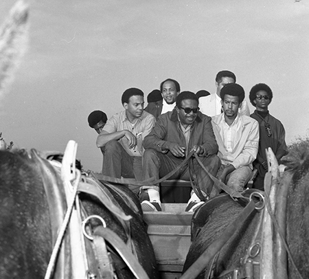 front- Andrew Young (left), Rev. Ralph Abernathy (right), back -Watani Stiner (right)