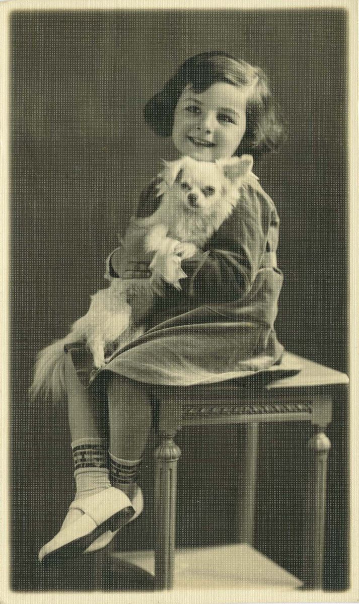 Portrait photograph of Liliane Ransom with dog