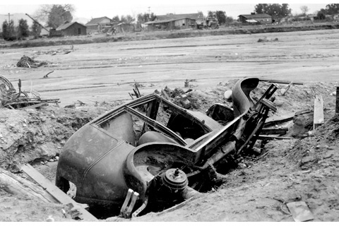 Los Angeles River flood aftermath in North Hollywood, 1938, Robert and Betty Holtby. San Fernando Valley History Digital Library.