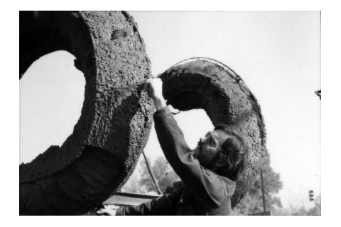 Artist John Banks works on his sculpture