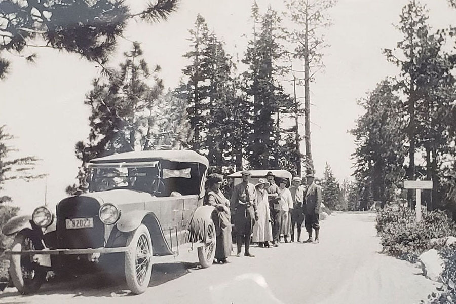 Johnson family standing on the road next to their cars, 1922, Johnson Family Echo Lake Photograph Collection