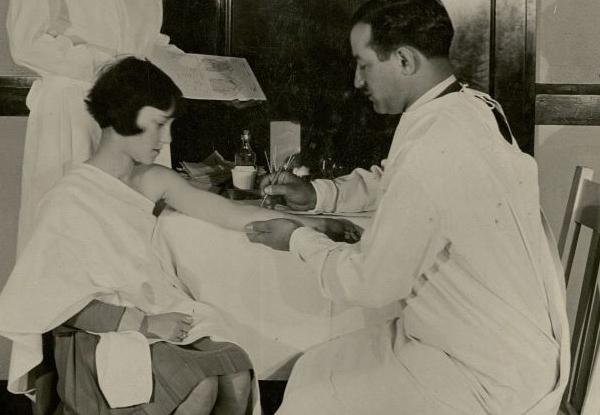 Child receiving an inoculation, California Historic Photographs Collection