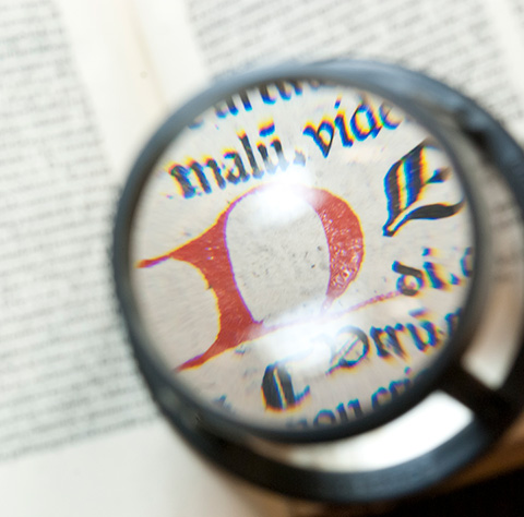 loop magnifier on old-fashioned text