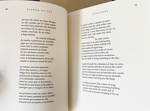 First page of the poem showing the original Spanish alongside the English translation on facing pages