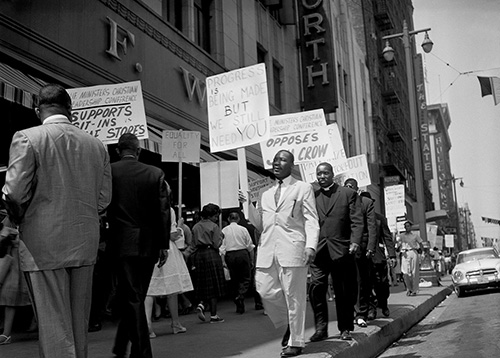 Dr. Martin Luther King Jr. leading a protest at a Woolworth store, Los Angeles. 1960, Charles Williams, 09.CW.N45.01.08A