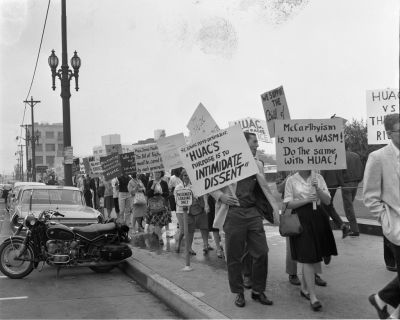 Protesters march against HUAC