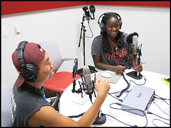 Students in the Library's Creative Maker Studio Recording Room