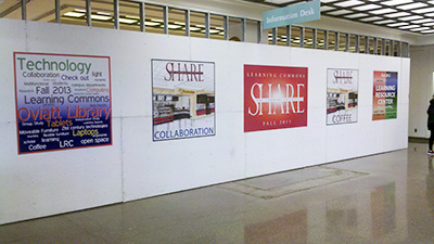 Future Site of the new Freudian Sip with Posters Advertising the Learning Commons