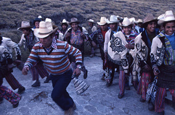Mayan men wait in line to vote, Guatemala, 1982
