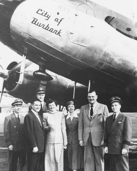 Colonel Charles C. Sherman and his wife Edna K. Sherman being congratulated on a first successful year leading California Central Airlines, 1950