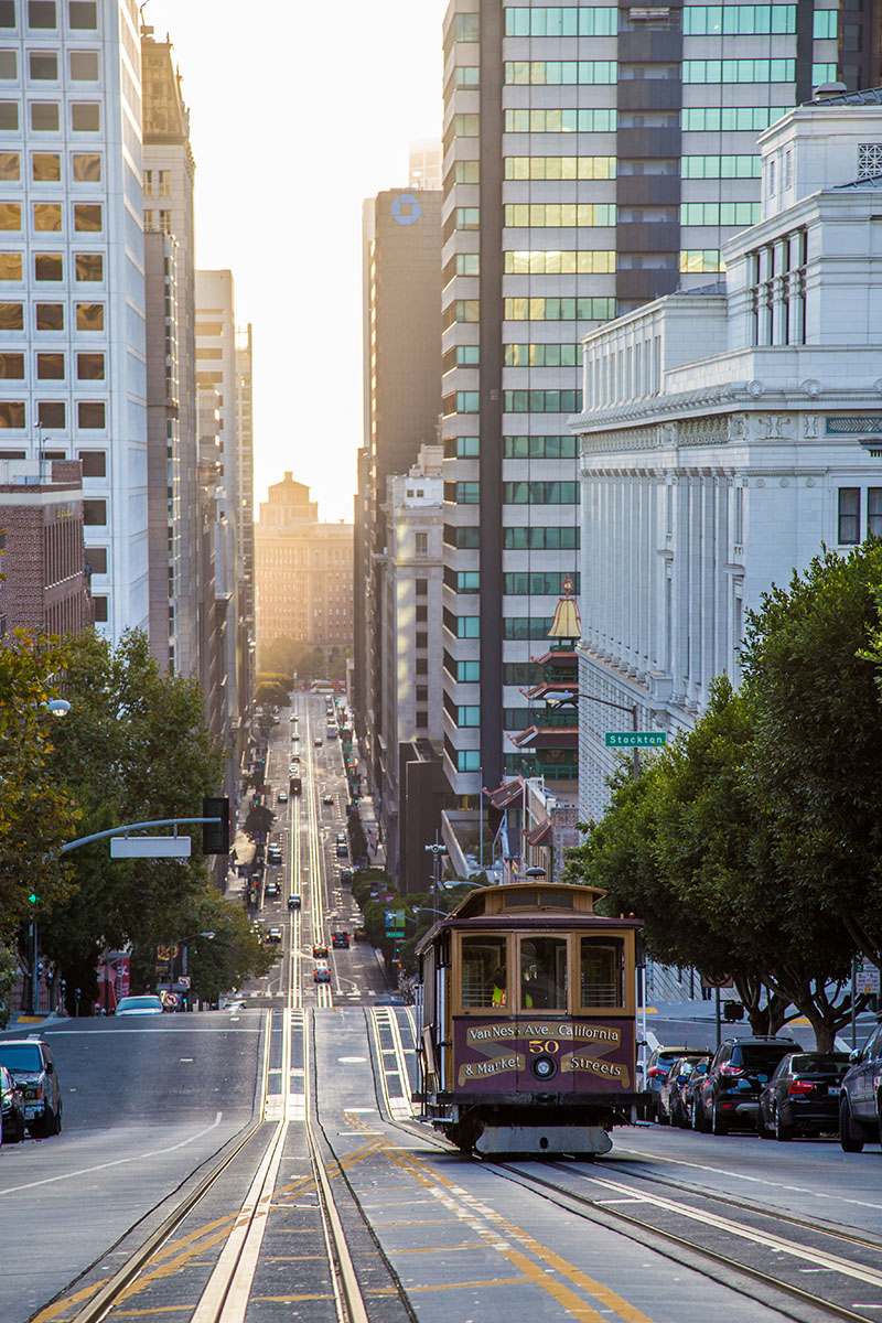 Cable car driving down streets of San Francisco