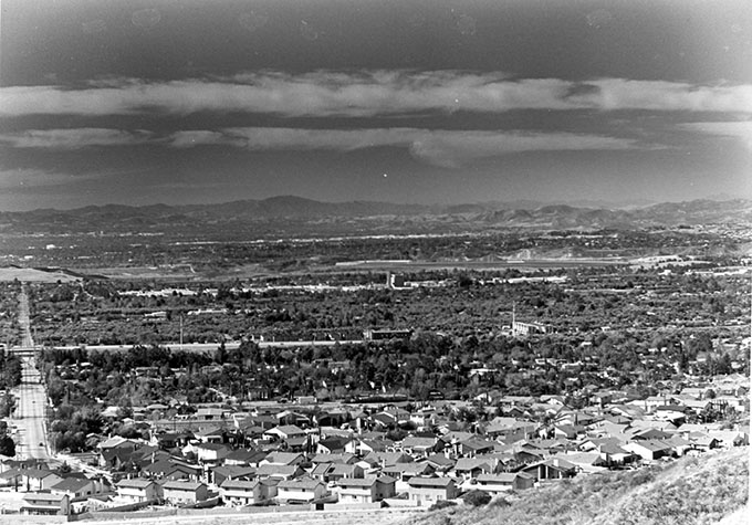 Aerial photo of the San Fernando valley with  housing development in the foreground